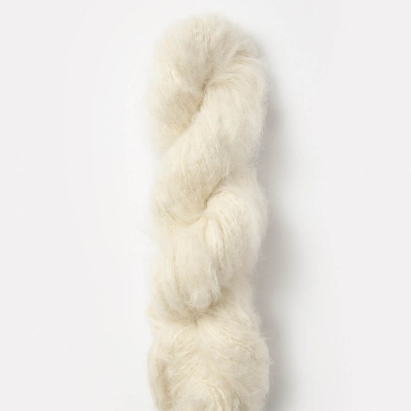 Whipped Cream color of Brushes Suri Yarn