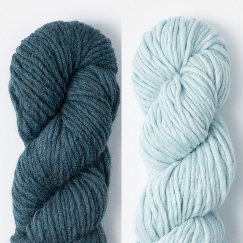 Two skeins of Woolstok North yarn in Loon Lake and Thermal Spring