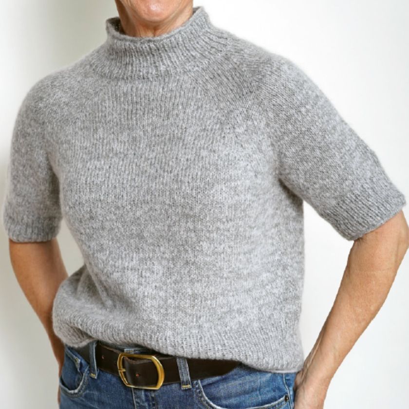 Model wears the Kiara Sweater in Euculyptus and Pearl White