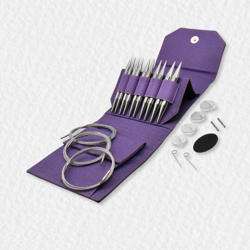 Set of bulky Lykke Flight knitting needles in a purple case on a white background