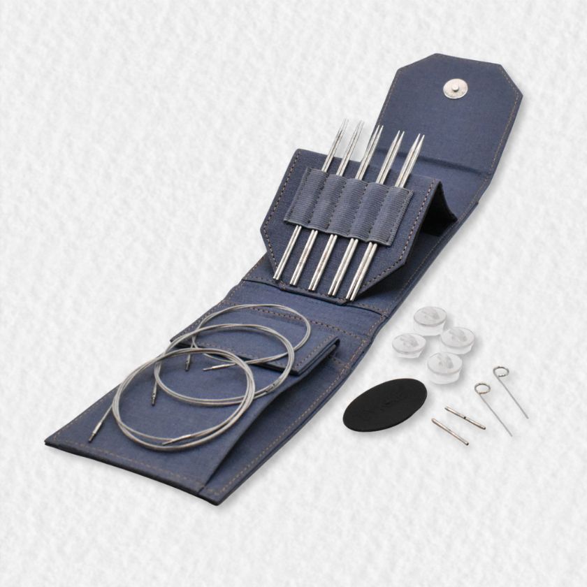 Mini set of Lykke Flight knitting needles in a denim blue case on a white background