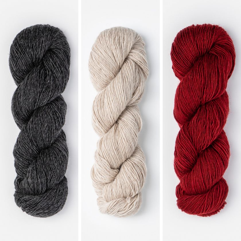 Skeins of yarn for the Tivoli Shawl in Iron and Ember