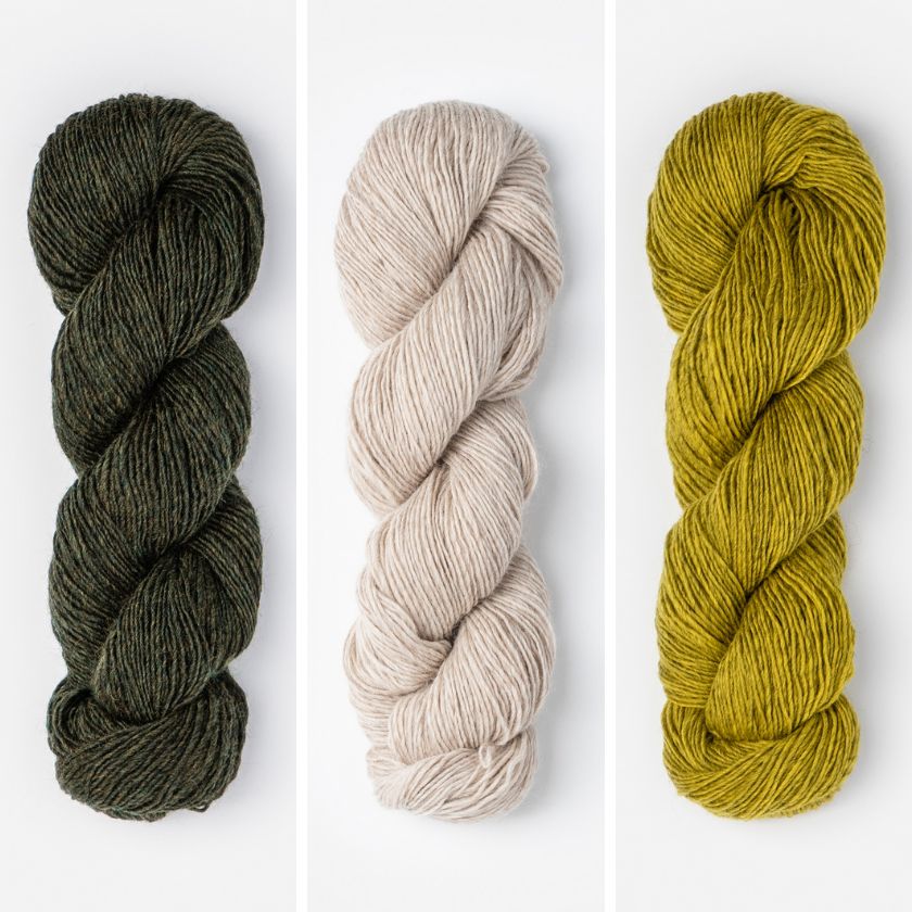 Skeins of yarn for the Tivoli Shawl in Moss and Timber