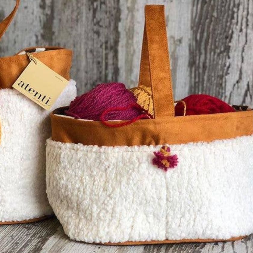The Sherpa Caddy with maroon and gold yarn