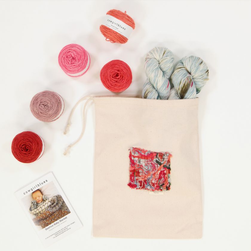 The Beehive baby blanket in pinks and red by cowgirlblues from The Dizzy Knitter