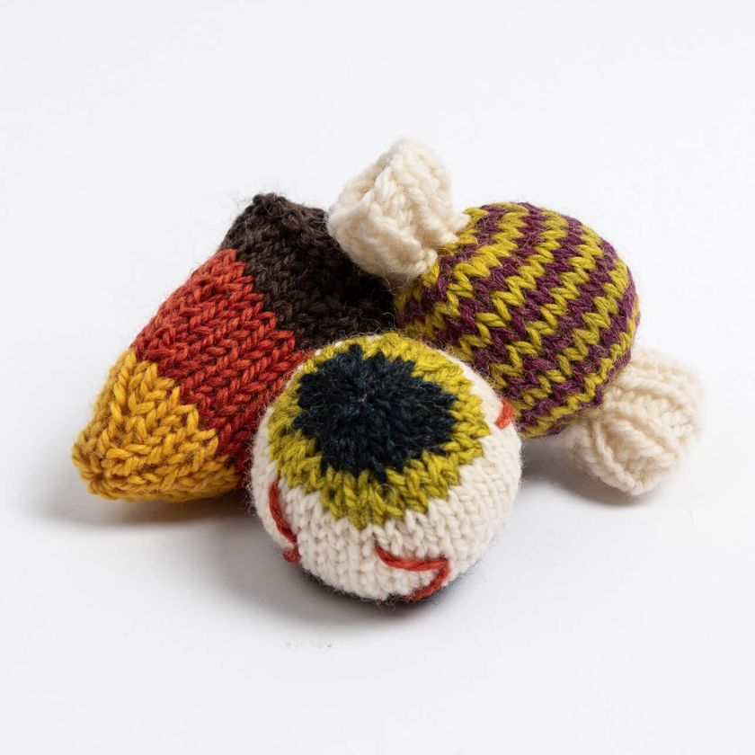 Fright and Delight halloween themed knitting project with eyeball, candy corn and candy