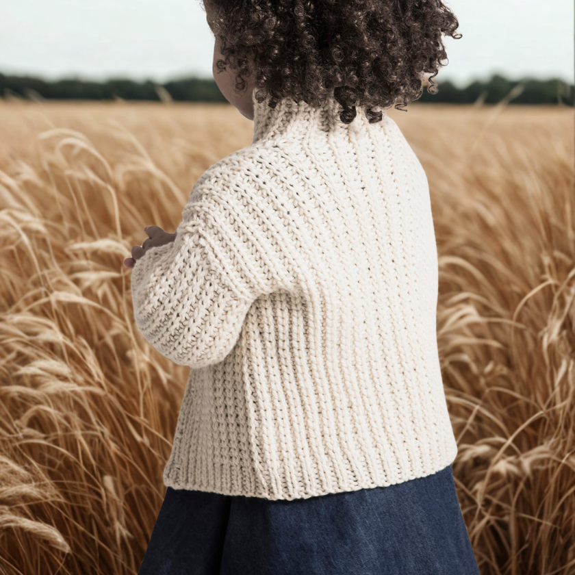 back view of toddler knit cardigan cookies and cream cardi fisherman rib texture detail