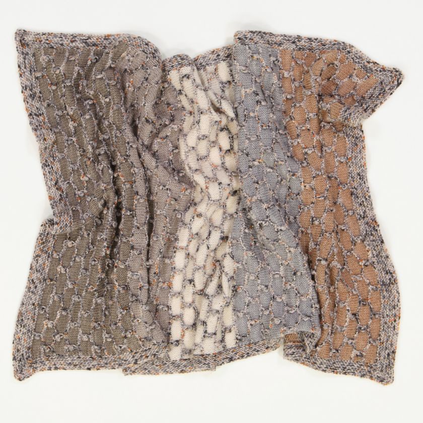 A completed Beehive Baby blanket in neutral by cowgirlblues