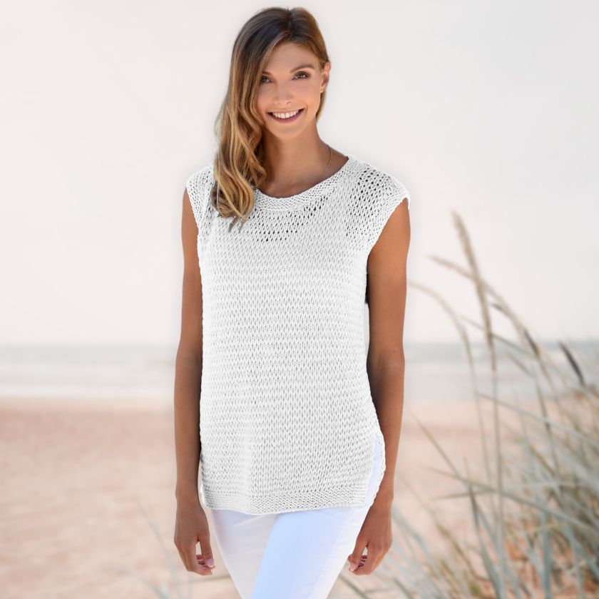 Model wearing the Dorothea Tank from the Dizzy Knitter in Pearl