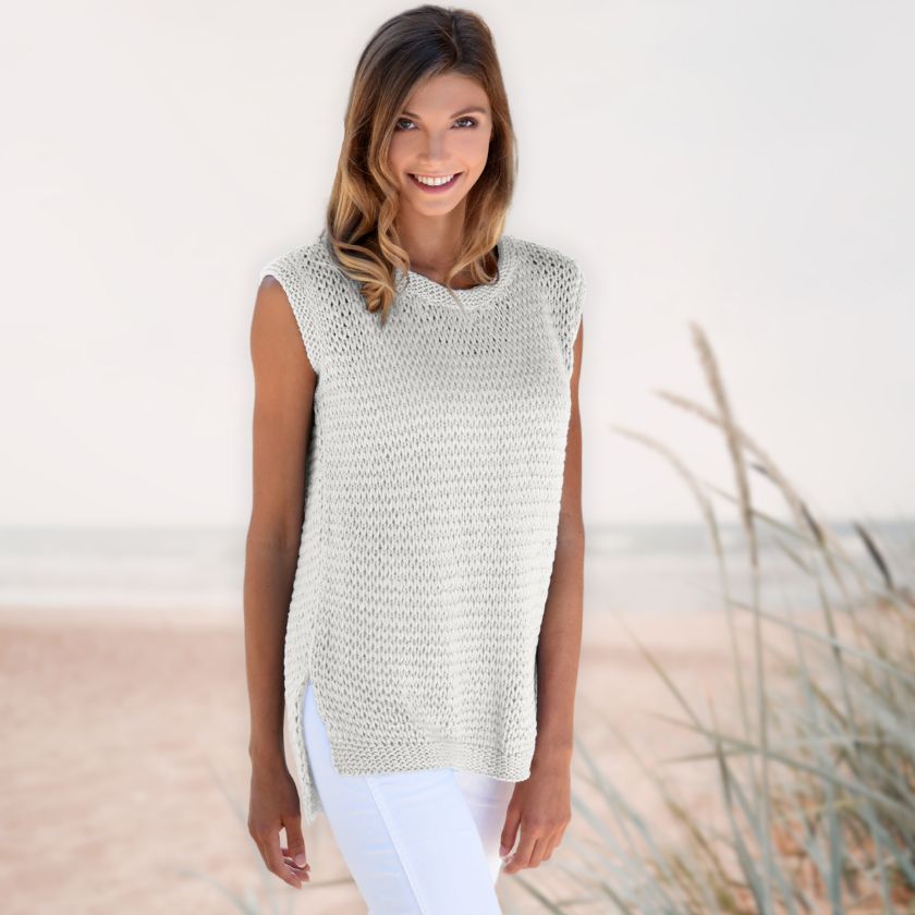 Model wearing the Dorothea Tank from the Dizzy Knitter in Sandy Castle yarn