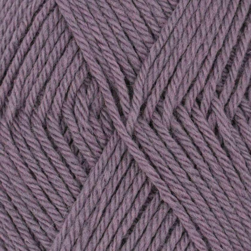 Close-up of Ella Rae Classic wool yarn in Grape with a textured pattern