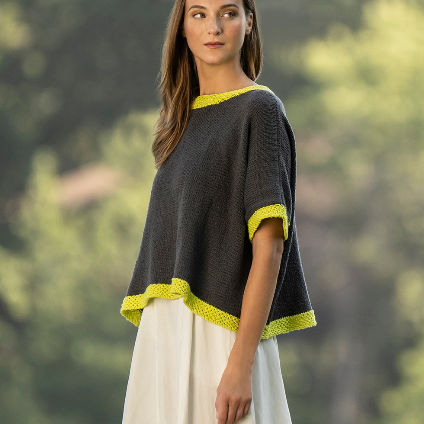 Side view of France Avenue Tee showing relaxed fit and drape