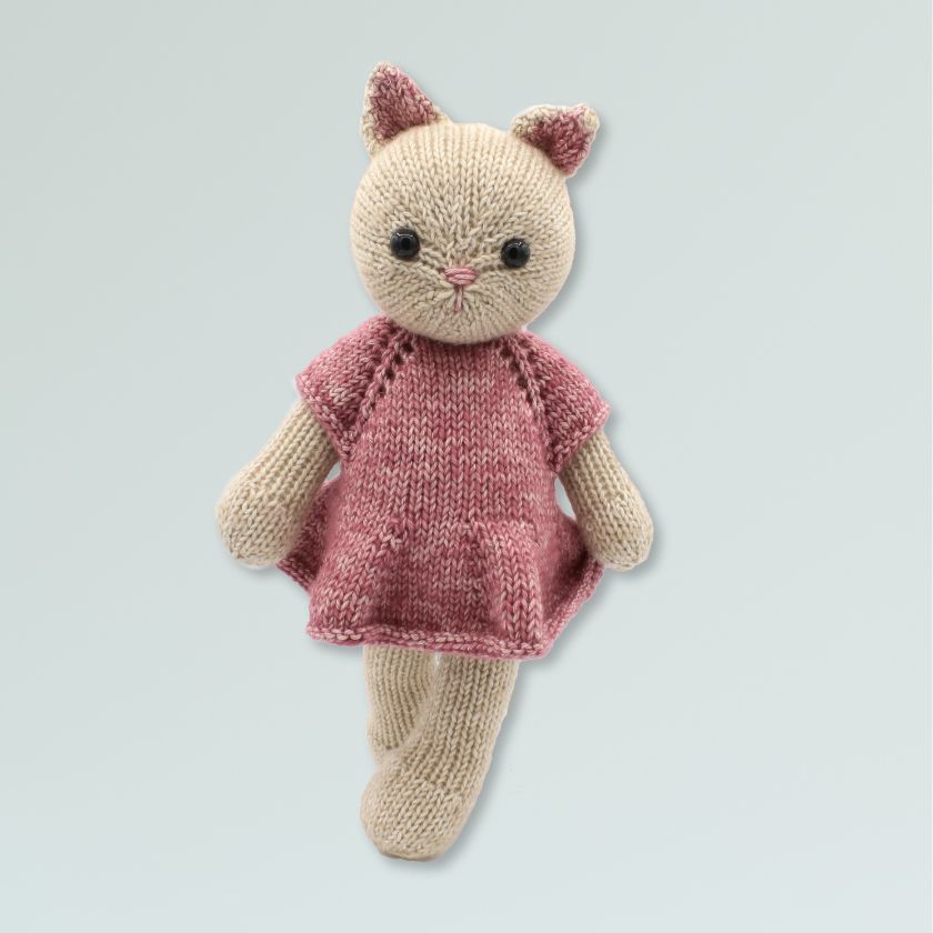 Knitted cat toy with pink dress by Amigurumi from The Dizzy Knitter