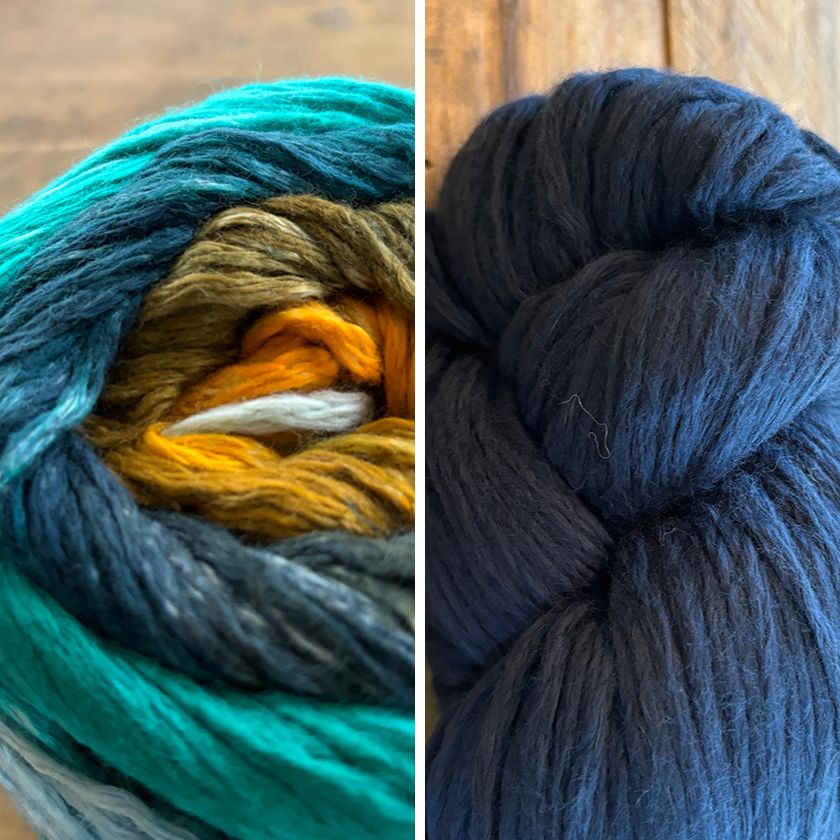 Two skeins of yarn, one multicolored and the other blue, on a wooden surface.