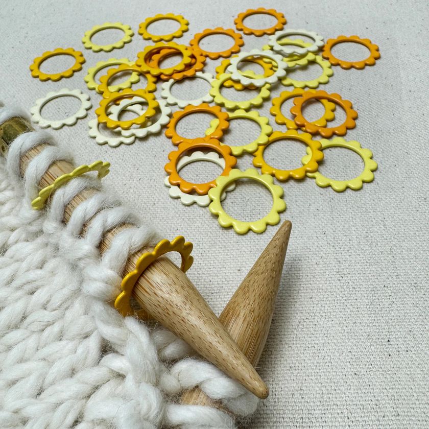 Sunshine shaped and colored knitting stitch markers from the Dizzy Knitter