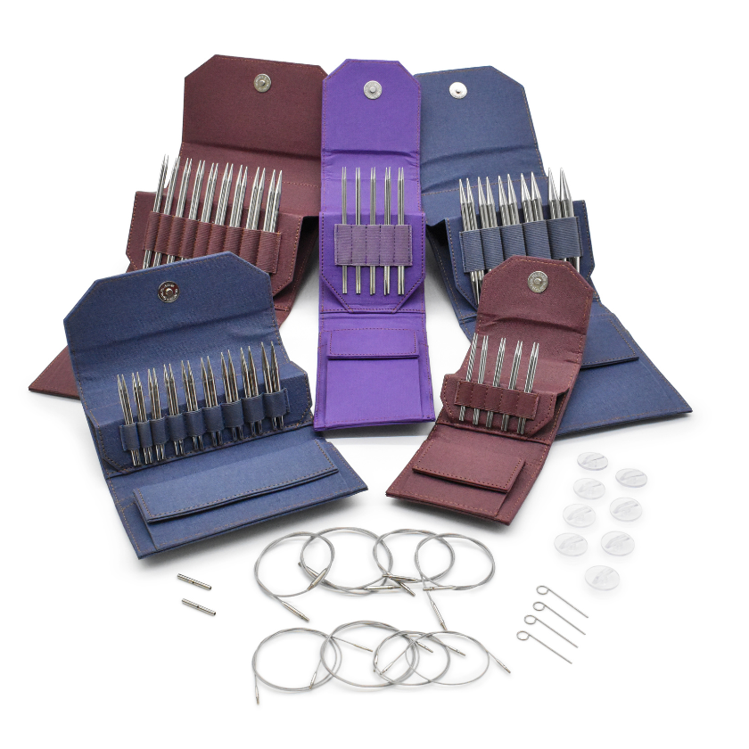 Set of Lykke knitting needles in various sizes with colorful cases on a white background