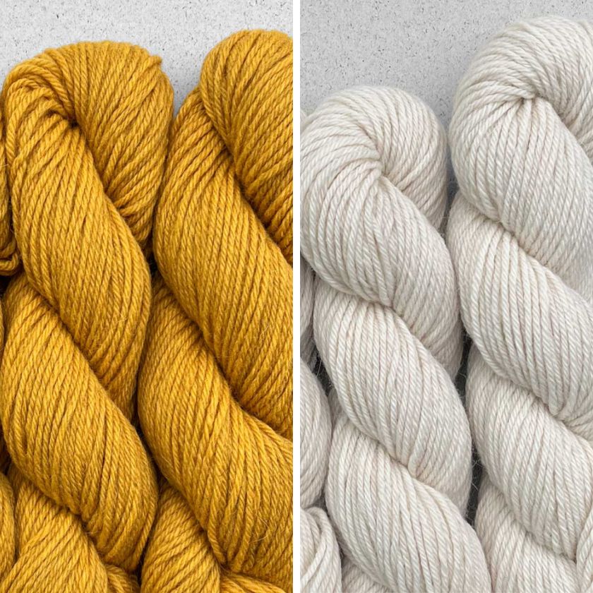 Skeins of yarn for the Milano sweater in Rose and Ecru