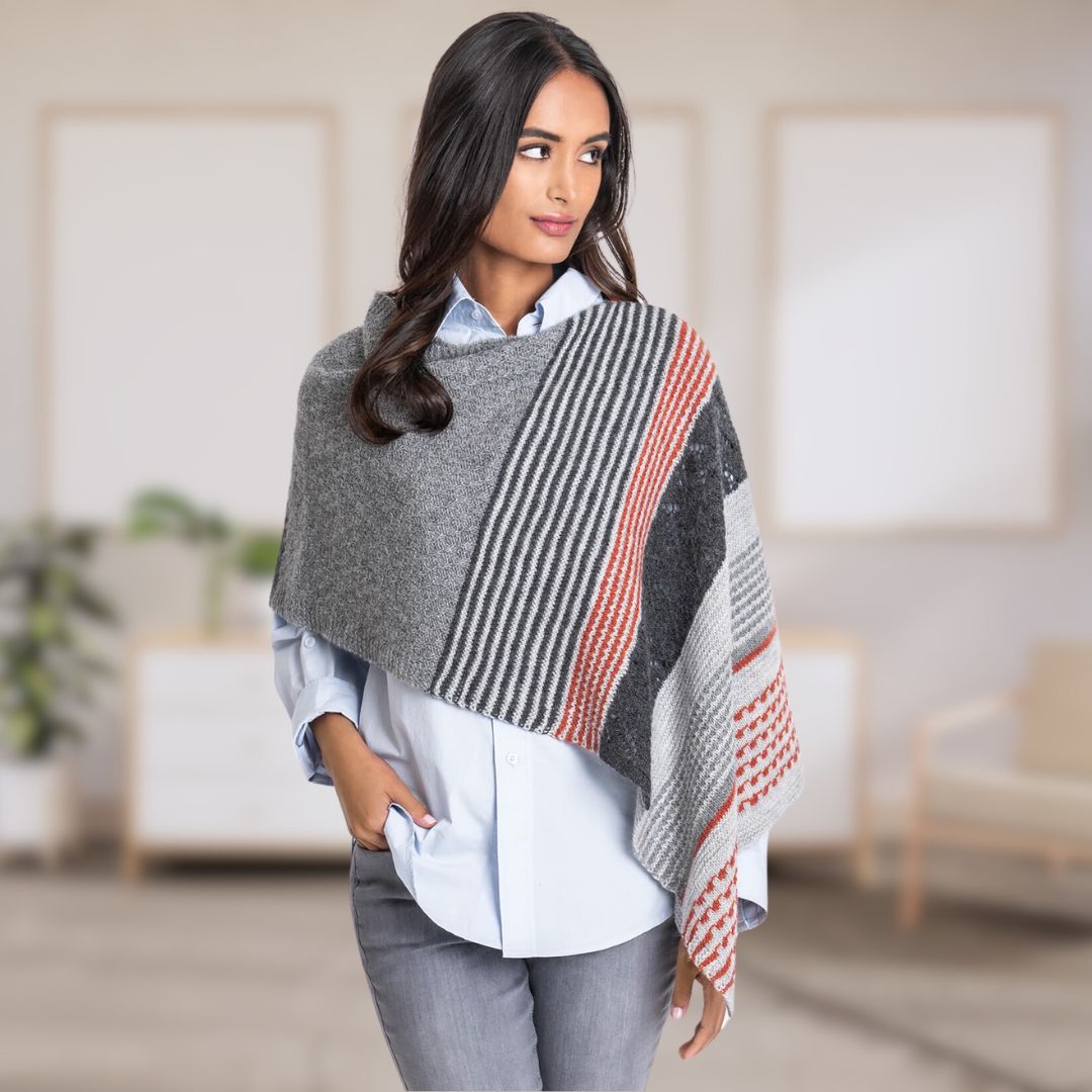Model wears the Persimmon Wrap from the Dizzy Knitter