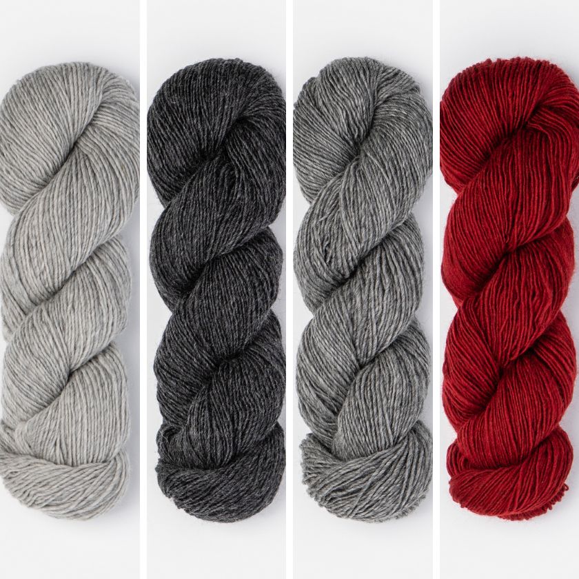 Skeins of yarn to make the Smoky Blaze color of the Persimmon Wrap