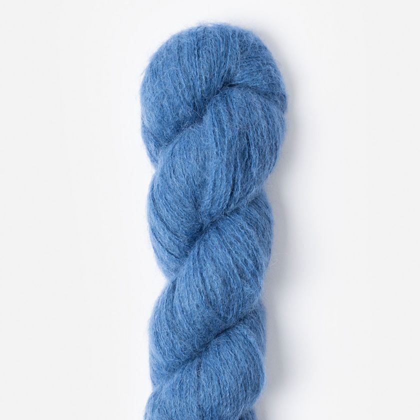 A skein of Prairie yarn by Blue Sky Fibers in Aster from the Dizzy Knitter