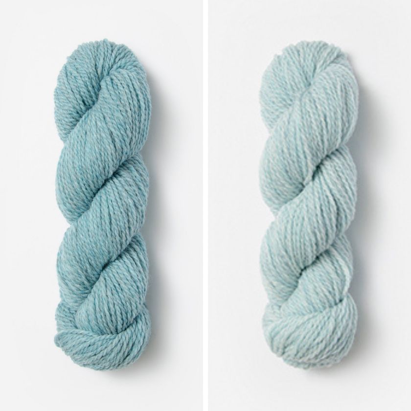 Two skeins of Woolstok Worsted yarn in the colors Spring Ice and Thermal Spring