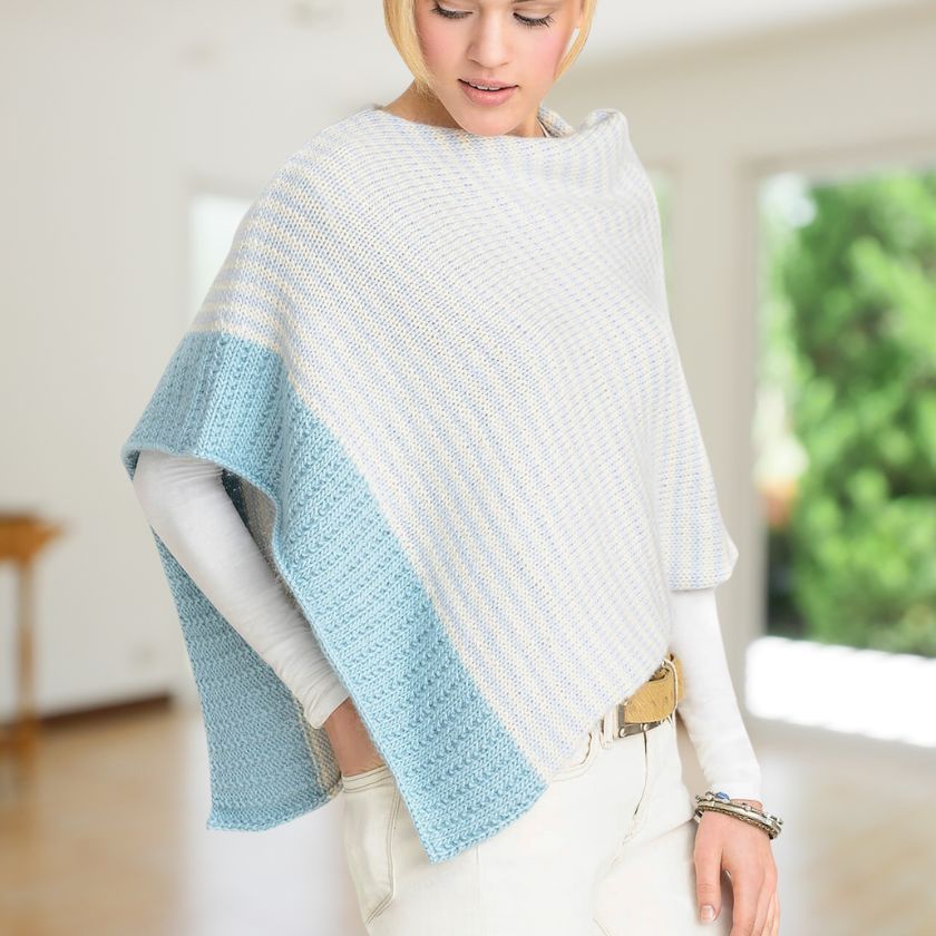 Woman wearing a light blue and white striped Bianca Wrap in a room