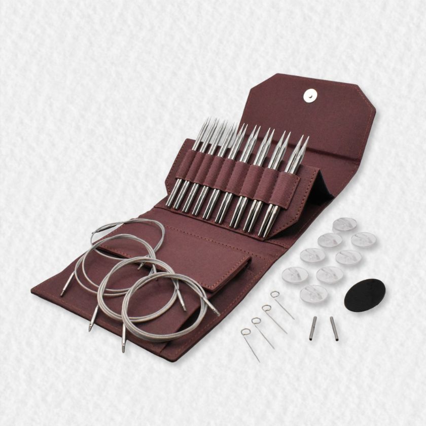 Set of Lykke Flight knitting needles in a maroon case on a white background