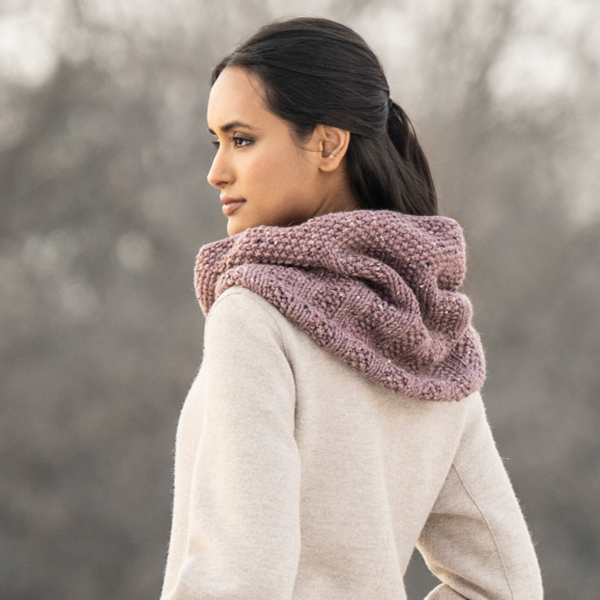 Back view of the Lulu Cowl knit cowl showing its plush ribbing and cozy fit around the neck.