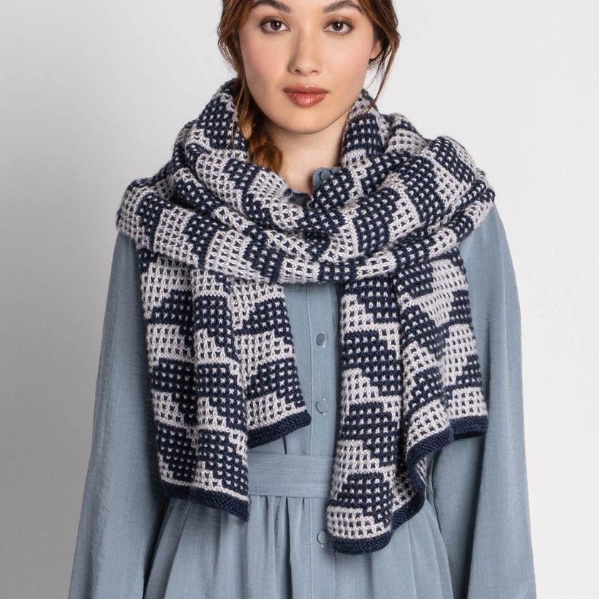 Model wearing a blue and white Market Street Wrap on a plain background
