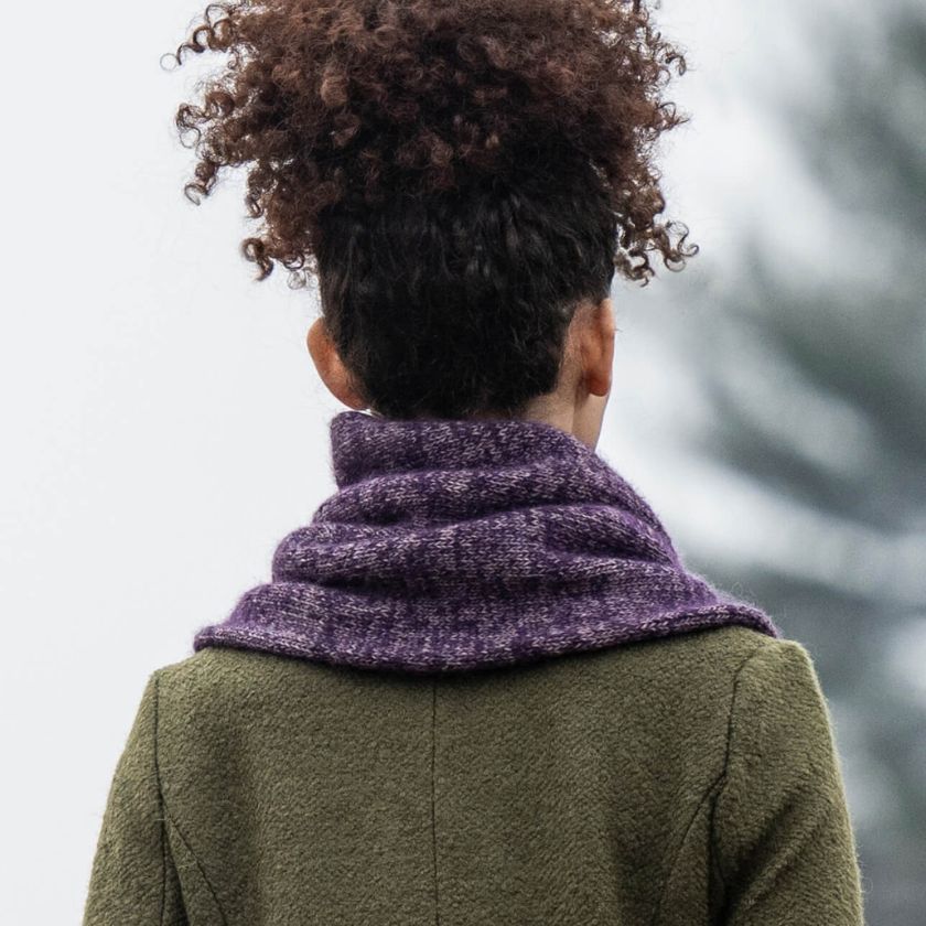 Model showing the back of the Orion Cowl from the Dizzy Knitter