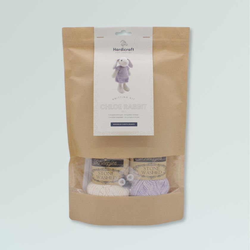 Amigurumi knitting kit for Chloe Rabbit, a knitted toy bunny in a purple dress from The Dizzy Knitter
