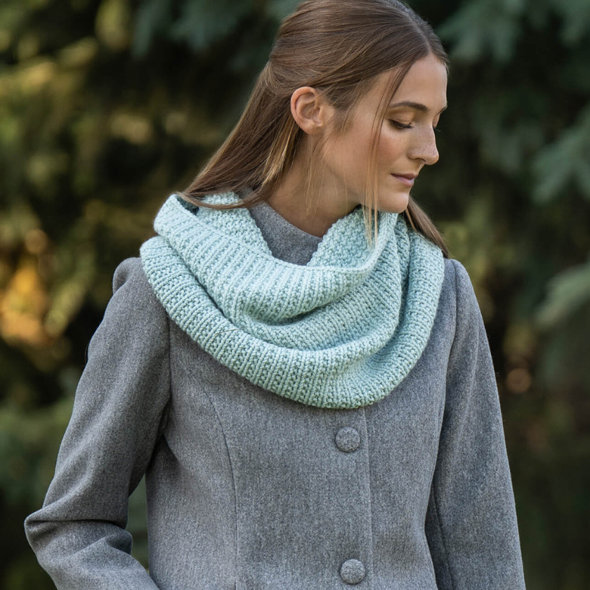 Mist Cowl knit in Blue Sky Fibers Extra Aran styled loosely around the neck for an effortless everyday look, The Dizzy Knitter
