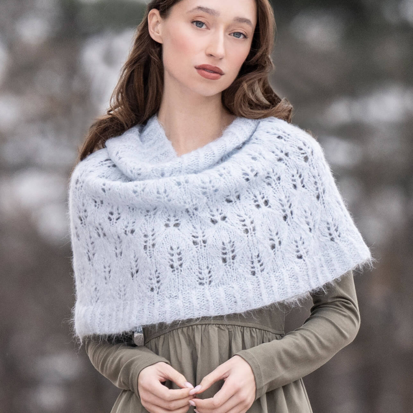 Rime Frost Snood knit in Blue Sky Fibers Brushed Suri DK, featuring an airy lace pattern and soft drape over the shoulders — The Dizzy Knitter.