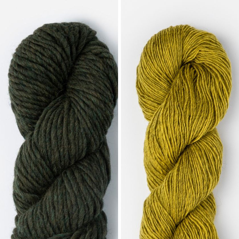 Two skeins of yarn for the Spangle Cowl, one dark green and one mustard yellow, on a white background.
