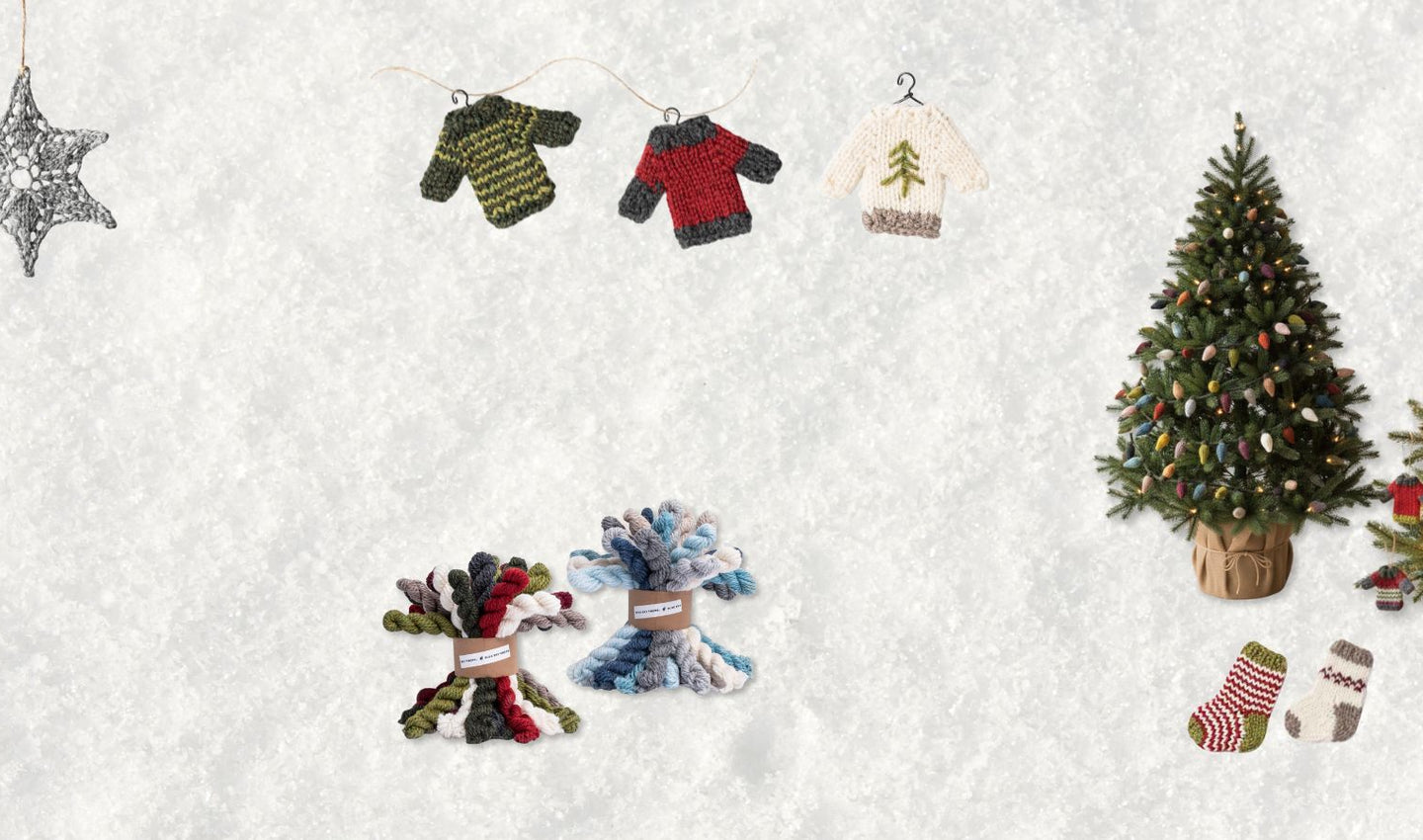 Decorative Christmas trees and ornaments on a snowy background