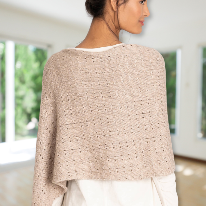 Back view of lace knit wrap highlighting stitch pattern