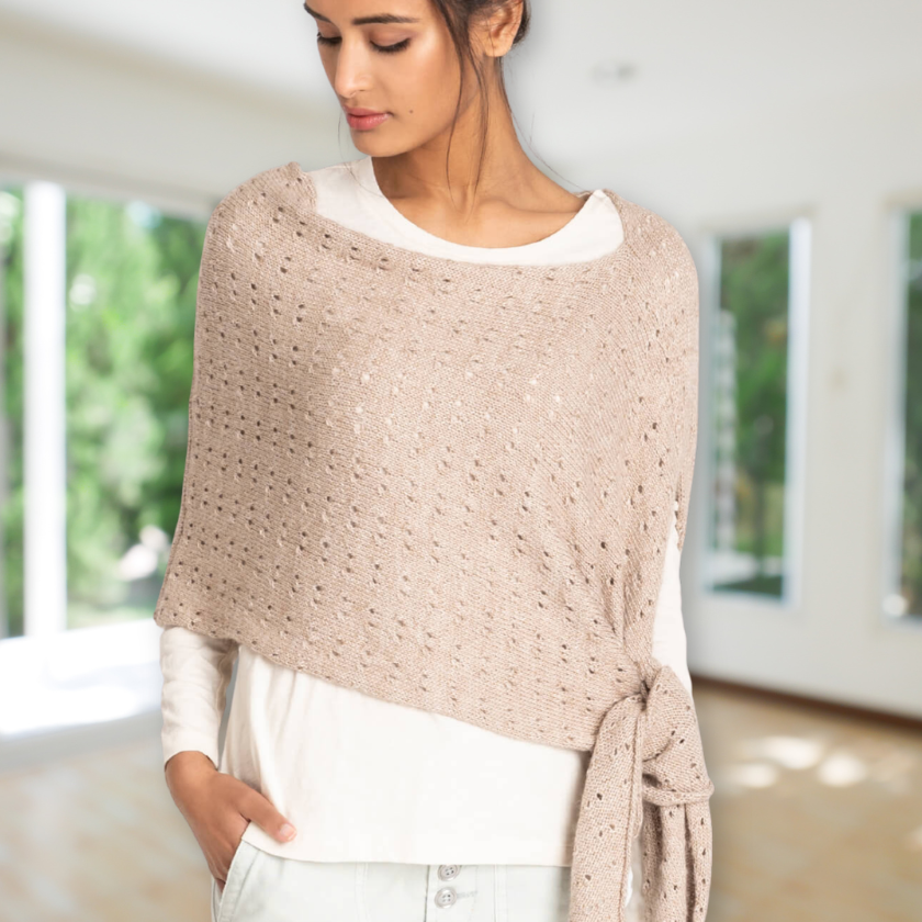 Lace knit wrap worn in front view with soft drape in alpaca silk yarn